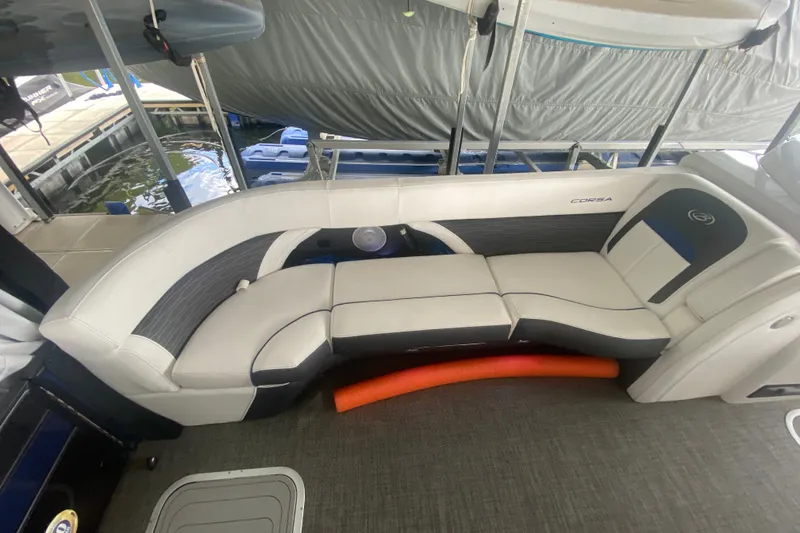 Slide: The Image of 2024 Barletta Corsa 25U boat interior with sleek seating and modern design. - 39
