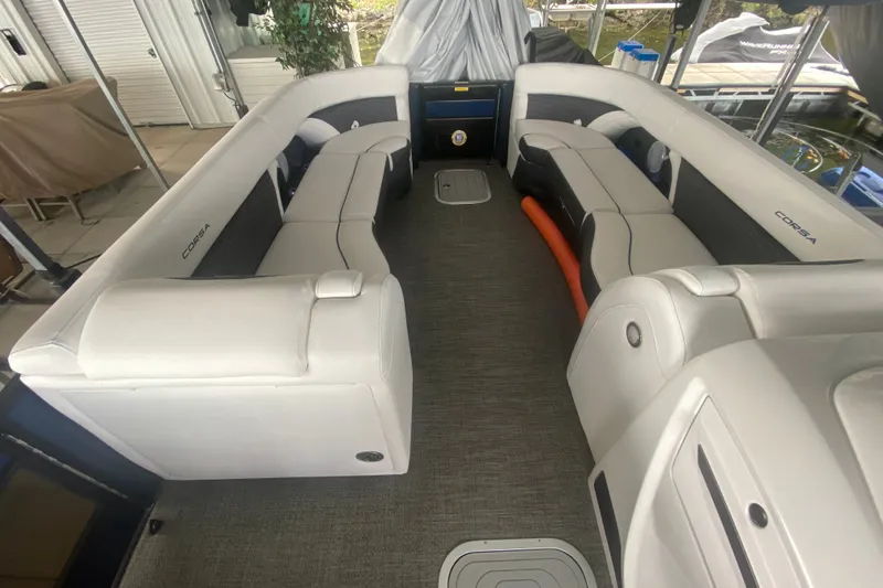 Slide: The Image of 2024 Barletta Corsa 25U pontoon boat interior with spacious seating and modern design. - 37