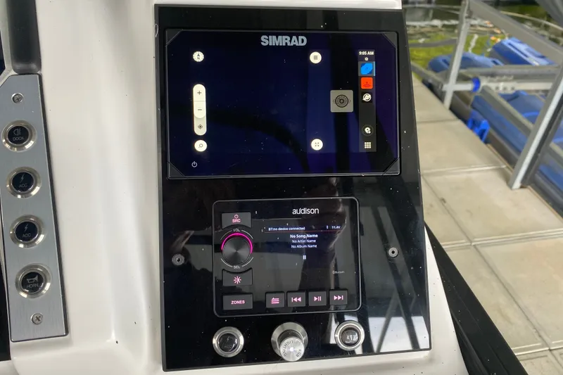 Slide: The Image of Control panel of 2024 Barletta Corsa 25U with Simrad and Audison displays. - 19