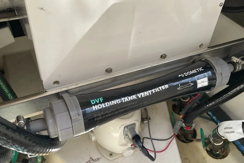 Slide: The Image of Dometic DVF holding tank vent filter in 2022 Pursuit OS 355 Offshore boat. - 43