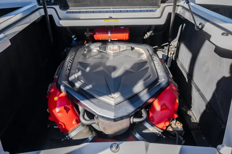 Slide: The Image of Engine compartment of 2016 Nautique Super Air Nautique G23 boat, featuring PCM engine. - 35