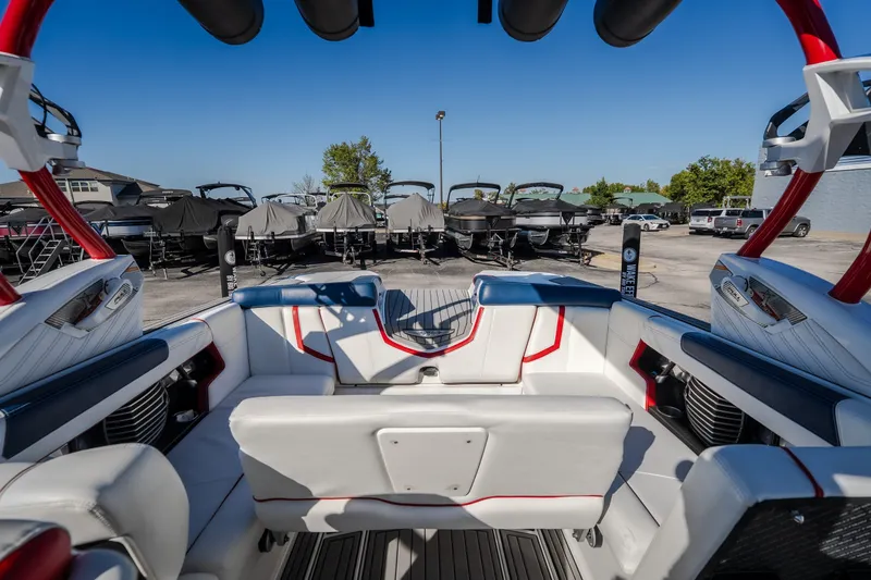 Slide: The Image of Interior of 2016 Nautique Super Air Nautique G23 boat at a dealership. - 31