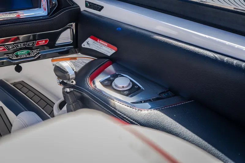 Slide: The Image of Interior controls of a 2016 Nautique Super Air Nautique G23 boat. - 14