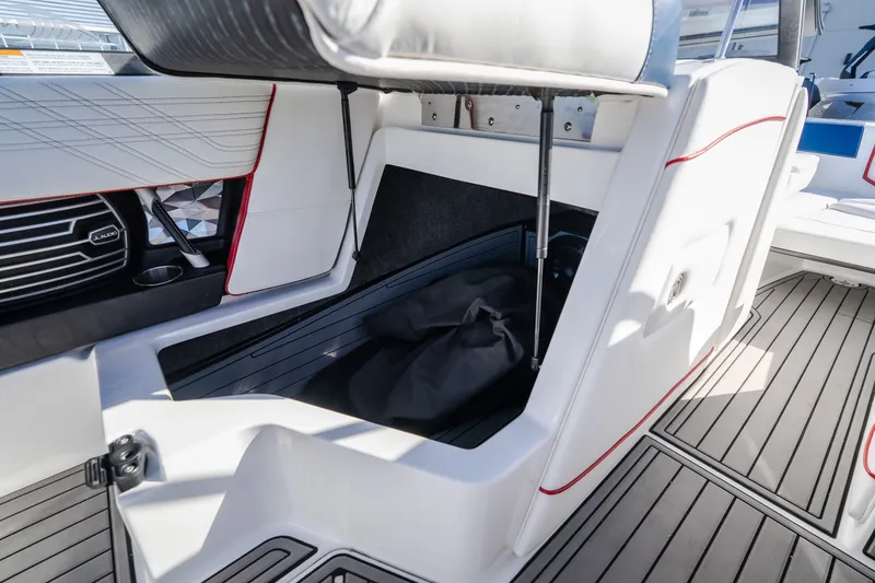 Slide: The Image of 2016 Nautique Super Air Nautique G23 interior storage compartment with sleek design and modern features. - 18