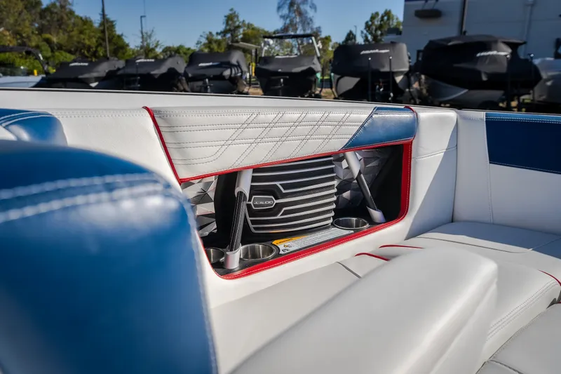 Slide: The Image of Interior of 2016 Nautique Super Air Nautique G23 boat with stylish seating and speaker system. - 23