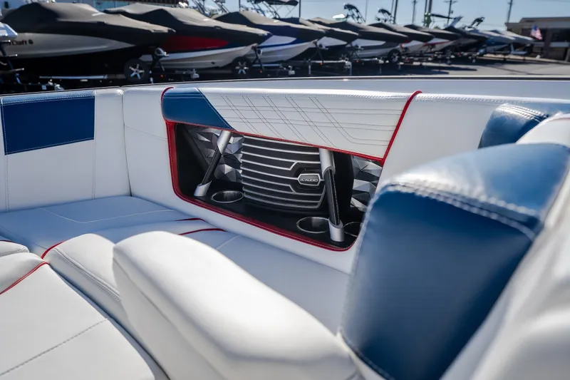 Slide: The Image of Interior of 2016 Nautique Super Air Nautique G23 boat with stylish seating and JL Audio speakers. - 22