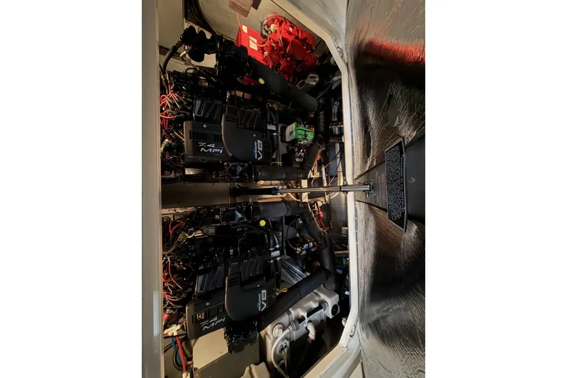 Slide: The Image of Engine compartment of a 1999 Sea Ray 340 Sundancer with twin 7.4 MPI engines. - 39