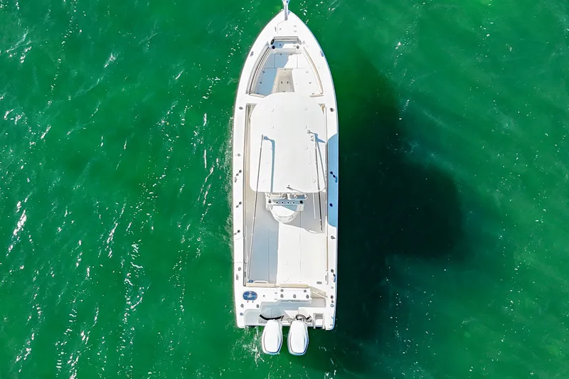 Slide: The Image of Aerial view of 2021 Sea Chaser 30 HFC CC boat on green water. - 4