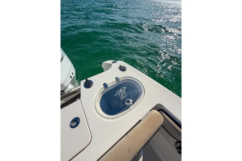 Slide: The Image of 2021 Sea Chaser 30 HFC CC boat on water, featuring deck details. - 18