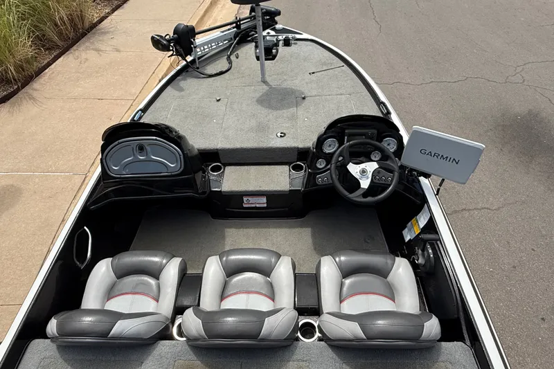 Slide: The Image of 2014 Nitro Z-6 boat interior with Garmin navigation system and three seats. - 9