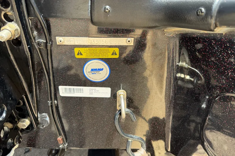 Slide: The Image of 2014 Nitro Z-6 boat identification plate with certification and warning labels. - 13