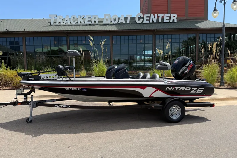 Slide: The Image of 2014 Nitro Z-6 boat parked outside Tracker Boat Center. - 0