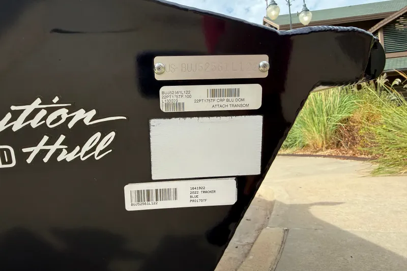 Slide: The Image of 2022 Tracker Pro Team 175 TF boat hull with identification labels and serial numbers. - 14