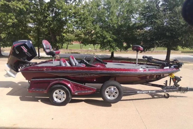 The Image of 2027 Ranger Z518VS Cup-Equipped boat on trailer, parked outdoors. - 0