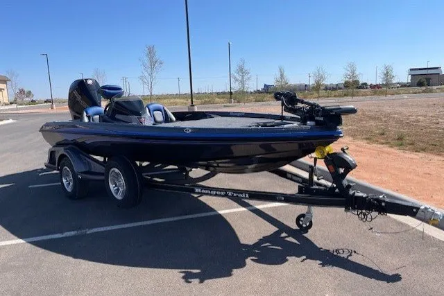 The Image of 2027 Ranger Z518VS Cup-Equipped boat on trailer in parking lot. - 0