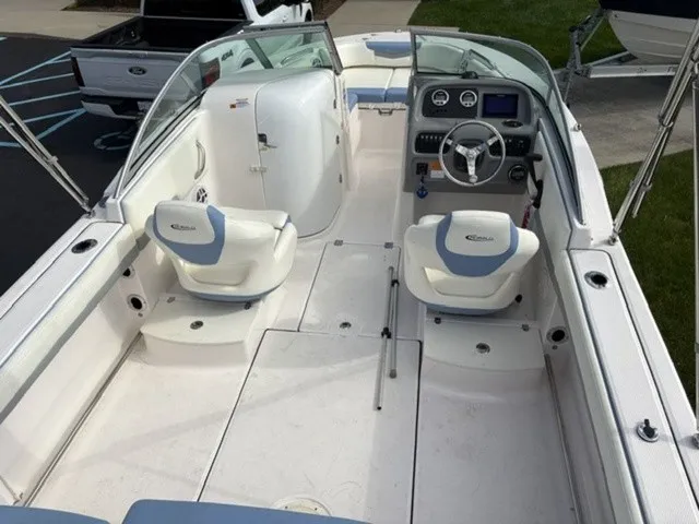 Slide: The Image of The image shows a 2023 Robalo R207 Dual Console boat with two seats and a helm station. - 16