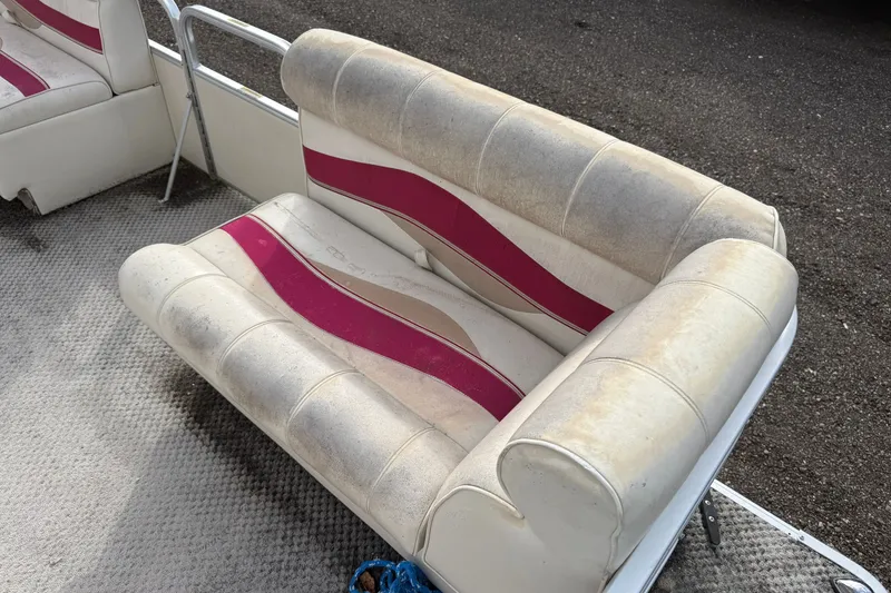 Slide: The Image of Worn Sweetwater Tuscany 1880 boat seat with pink and beige stripes, 2008 model. - 3