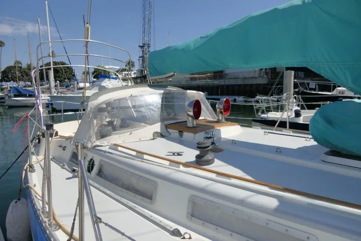 Slide: The Image of Sailboat Wauqueize Hood 38 MK II, 1984 model, docked in a marina. - 44