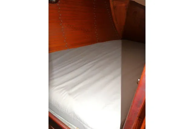 Slide: The Image of Interior cabin of 1984 Wauqueize Hood 38 MK II sailboat with wooden finish. - 24