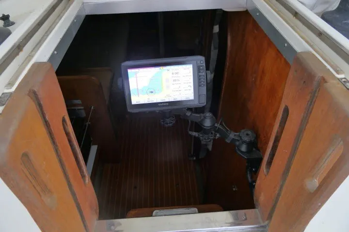 Slide: The Image of 1984 Wauqueize Hood 38 MK II sailboat interior with mounted navigation system. - 17