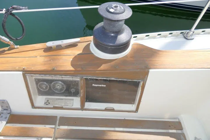 Slide: The Image of Cockpit of 1984 Wauqueize Hood 38 MK II sailboat with winch and navigation instruments. - 34