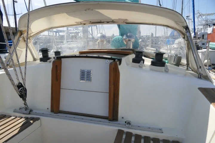 Slide: The Image of 1984 Wauqueize Hood 38 MK II sailboat cockpit with winches and wooden accents. - 37