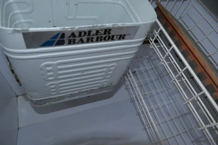 Slide: The Image of Adler Barbour refrigeration unit inside 1984 Wauqueize Hood 38 MK II sailboat. - 21