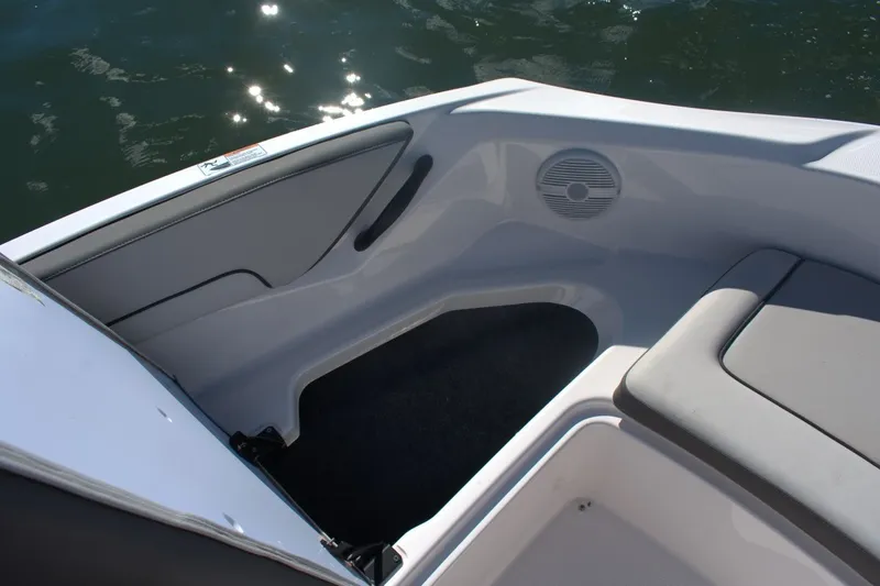 Slide: The Image of Interior view of 2025 Yamaha Boats AR190, featuring seating and speaker detail. - 7