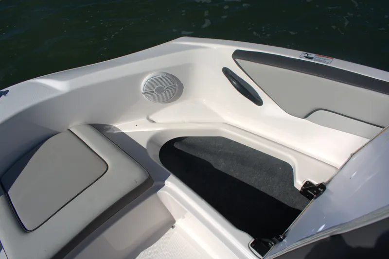 Slide: The Image of 2025 Yamaha Boats AR190 interior seating with speaker, showcasing modern design and comfort. - 8