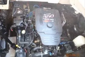 Slide: The Image of Engine of a 2004 Monterey 298SC Super Sport boat, featuring a 350 MAG MPI. - 15