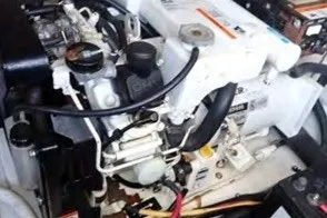 Slide: The Image of Engine of a 2004 Monterey 298SC Super Sport boat, showcasing mechanical components. - 16