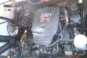 Slide: The Image of Engine of a 2004 Monterey 298SC Super Sport boat, featuring a 350 MAG MPI motor. - 14