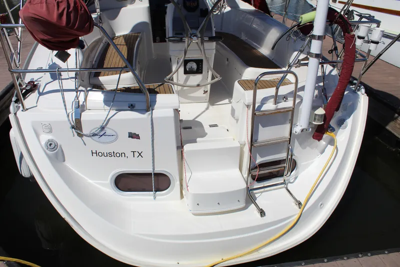 Slide: The Image of 2003 Dufour Gib Sea 37 sailboat stern view, docked in Houston, TX. - 4