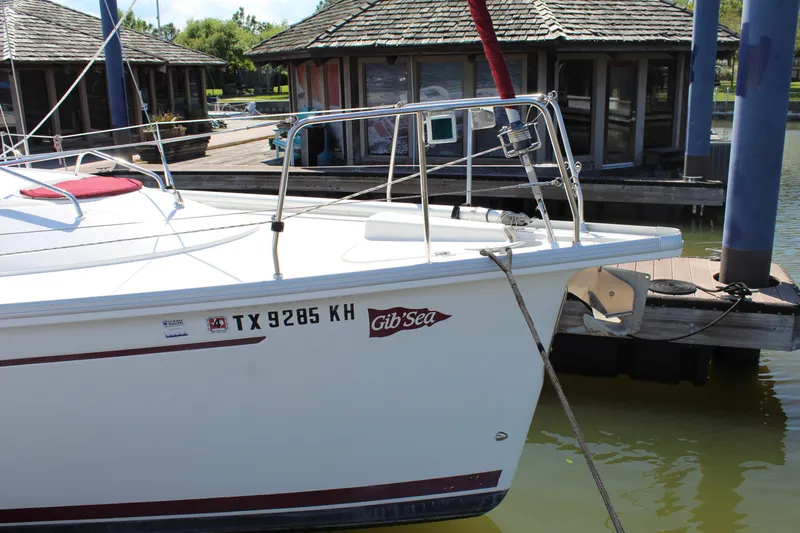 Slide: The Image of 2003 Dufour Gib Sea 37 sailboat docked at a marina. - 8
