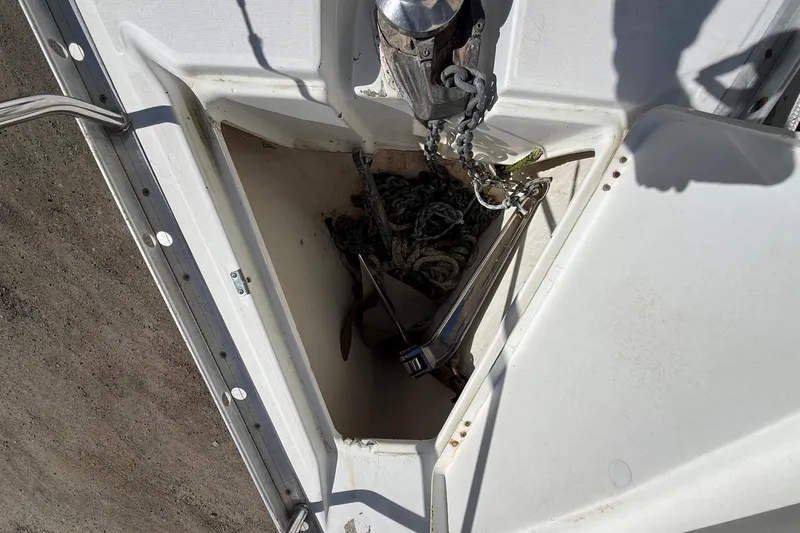 Slide: The Image of Anchor locker of a 2006 Beneteau Oceanis 343 sailboat with chain and rope. - 13