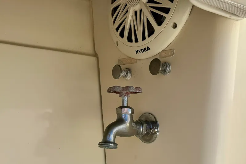 Slide: The Image of Rusty faucet and speaker on 1985 Chris-Craft 382 Commander boat interior. - 77
