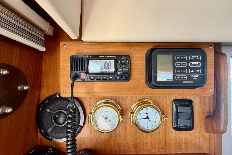 Slide: The Image of Control panel of 1985 Chris-Craft 382 Commander with radio and gauges. - 42