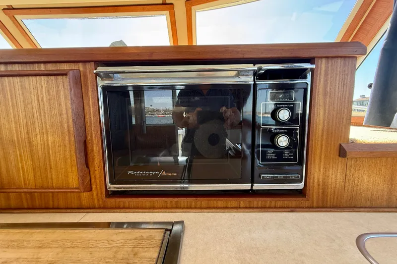 Slide: The Image of 1985 Chris-Craft 382 Commander interior with vintage Amana Radarange microwave. - 25