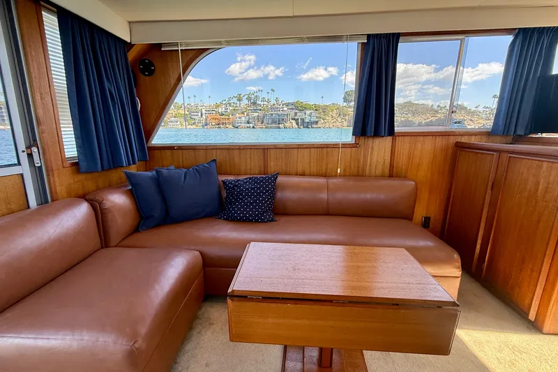 Slide: The Image of Interior of 1985 Chris-Craft 382 Commander with leather seating and scenic window view. - 16