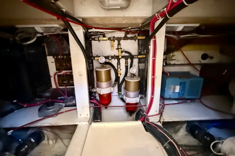Slide: The Image of Engine room of 1985 Chris-Craft 382 Commander with visible wiring and components. - 83