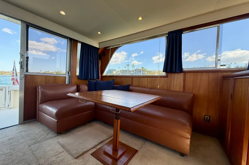 Slide: The Image of Interior of 1985 Chris-Craft 382 Commander with leather seating and ocean view. - 17