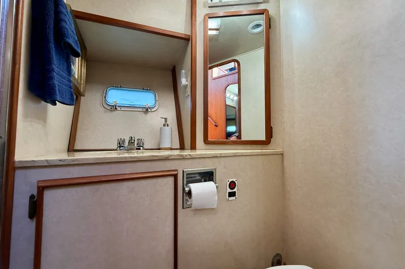 Slide: The Image of Bathroom interior of 1985 Chris-Craft 382 Commander yacht with mirror and sink. - 37