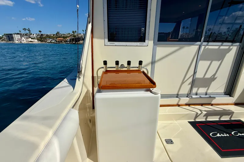 Slide: The Image of 1985 Chris-Craft 382 Commander yacht deck with ocean view and sleek design. - 50