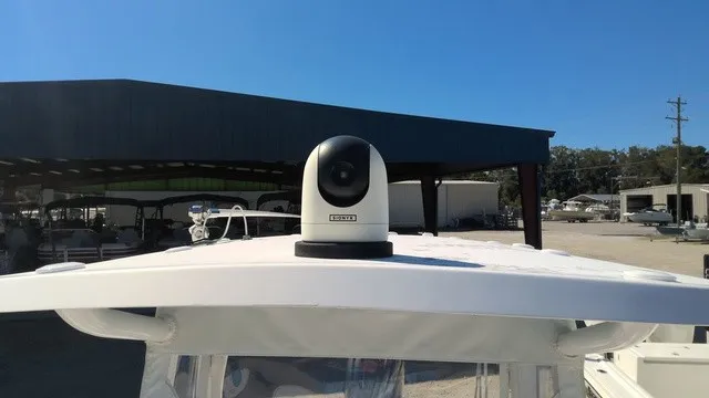 Slide: The Image of A camera is mounted on the roof of a boat. - 10