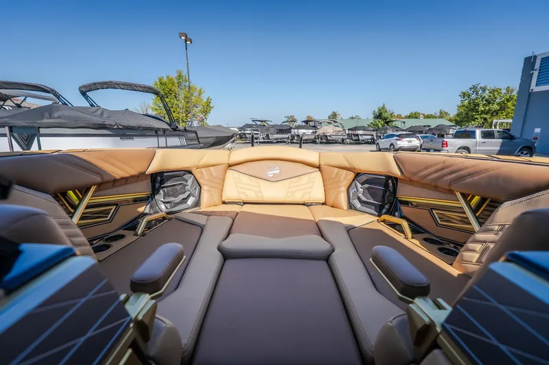 Slide: The Image of Luxurious interior of 2027 Tigé Ultré 25ZX boat with plush seating and modern design. - 59