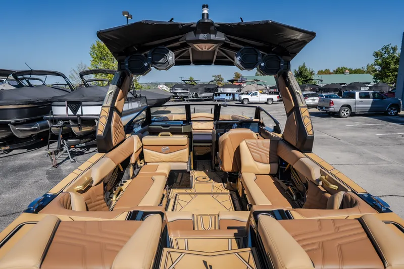 Slide: The Image of 2027 Tigé Ultré 25ZX boat interior with luxurious tan seating and modern design. - 33