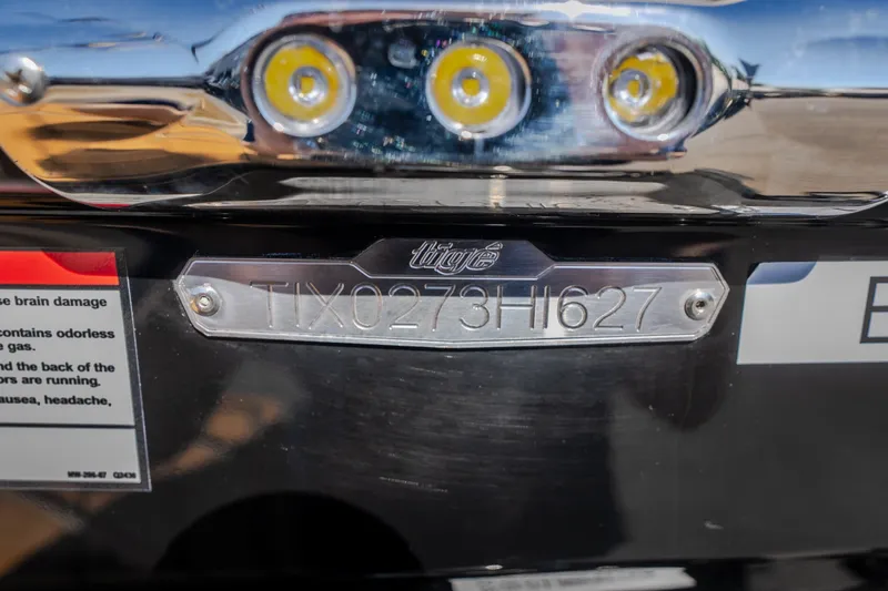 Slide: The Image of Hull identification number on a 2027 Tigé Ultré 25ZX boat. - 11