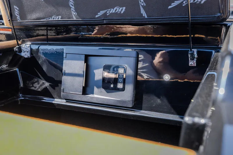 Slide: The Image of Control panel inside 2027 Tigé Ultré 25ZX boat, featuring sleek design and modern technology. - 19