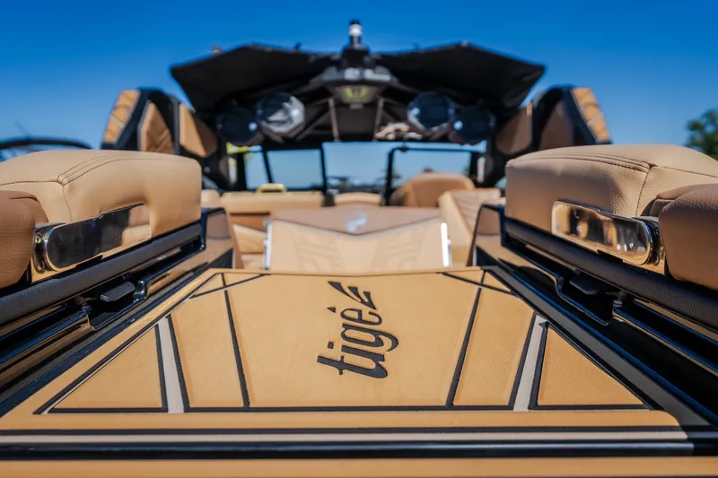 Slide: The Image of 2027 Tigé Ultré 25ZX boat interior with luxurious seating and sleek design. - 35
