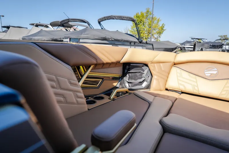 Slide: The Image of Luxurious interior of 2027 Tigé Ultré 25ZX boat with premium seating and speaker system. - 57